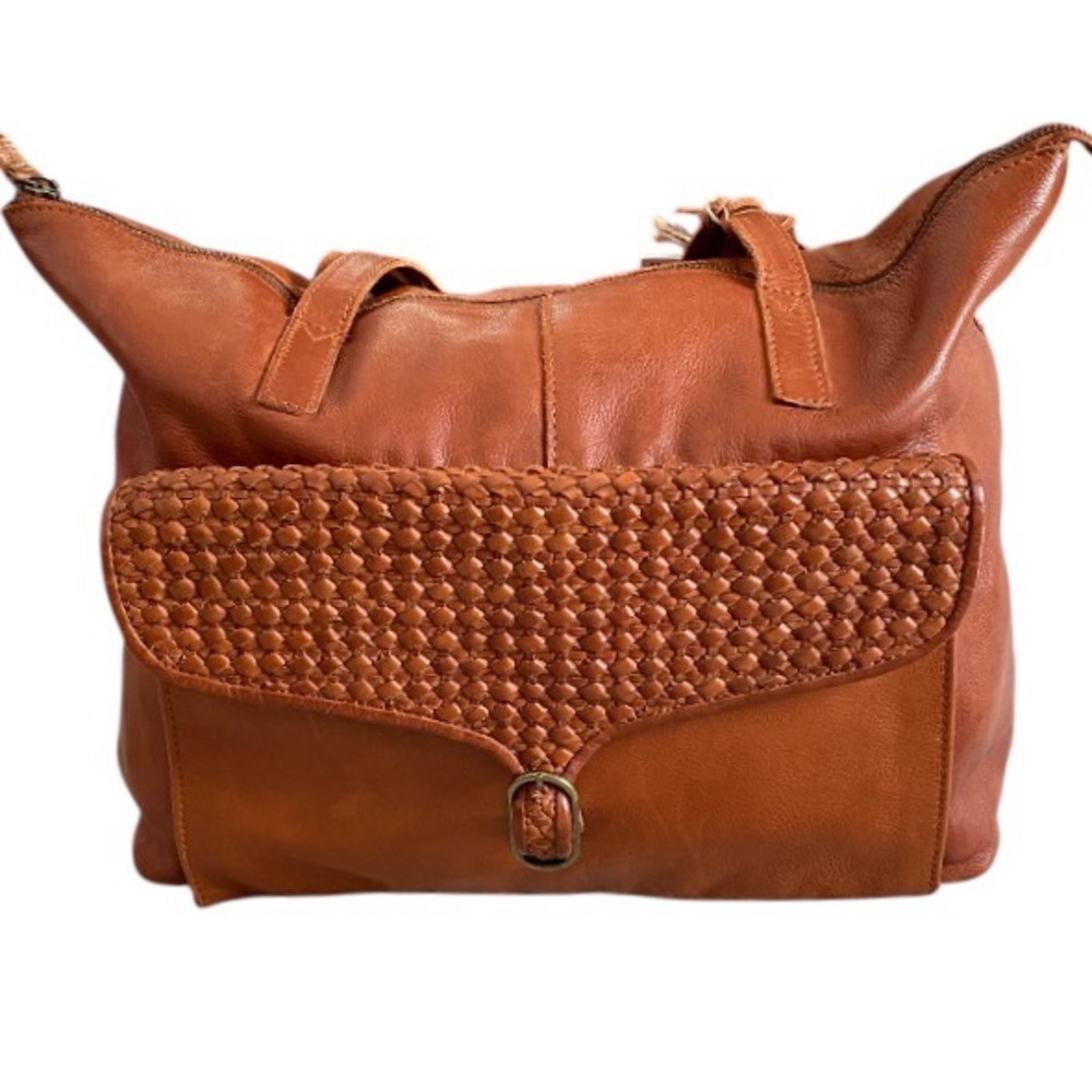 The artisans of India vintage look front pocket leather tote